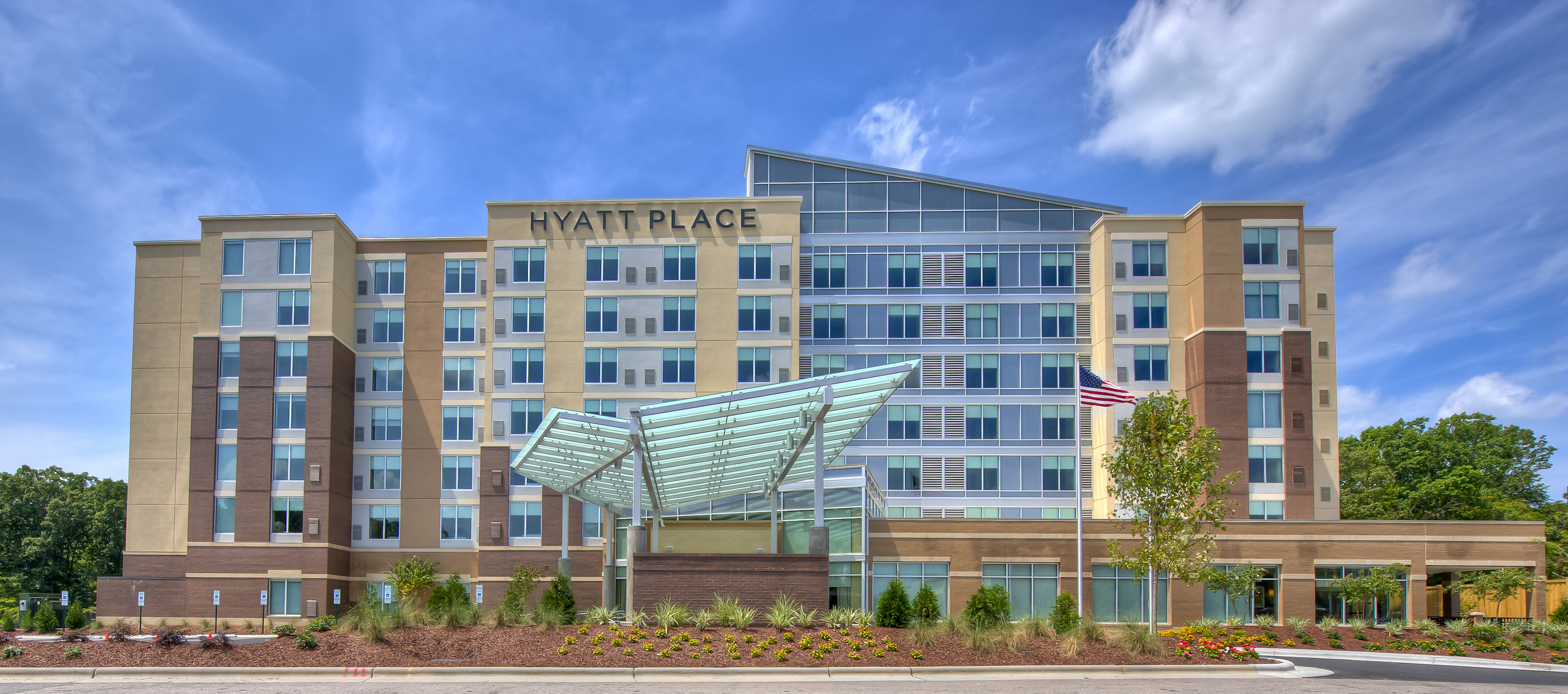 Front-on view of the exterior of the Hyatt Place Hotel in Durham